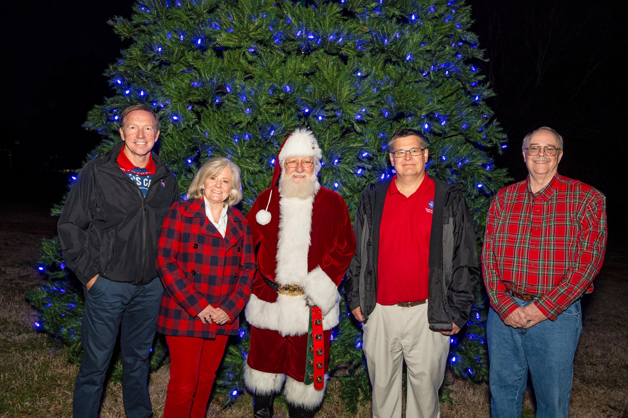 Taking part in the holiday tree lighting are, from left, Marshall Associate Director Steve Miley, Director Jody Singer, Santa Claus, Associate Director, Technical, Larry Leopard, and Deputy Director Rick Burt. 