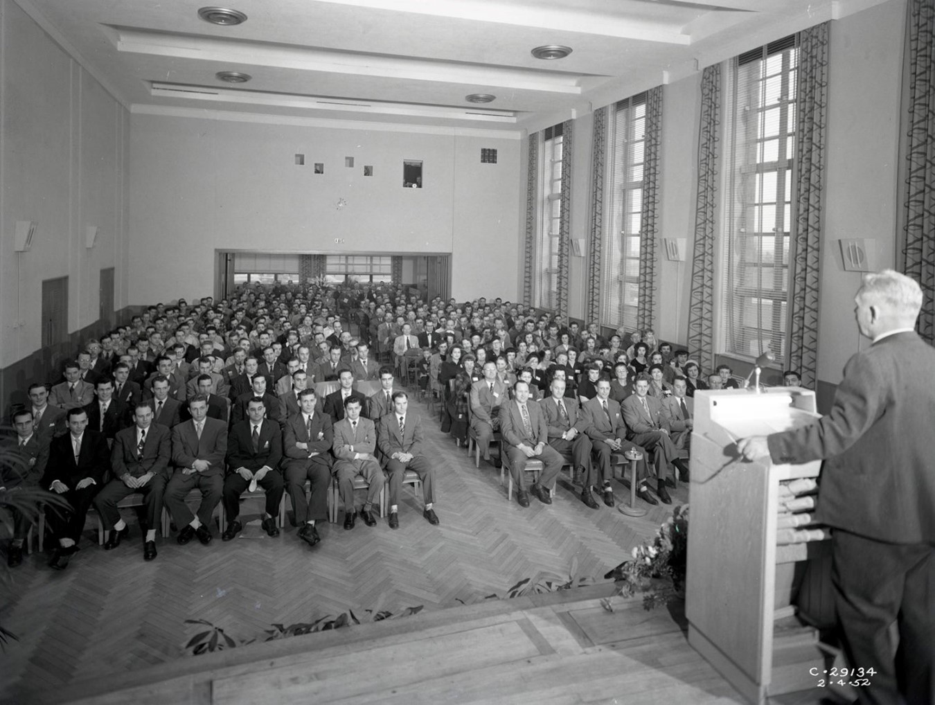 Vintage black and white view of the auditorium in the Ad building from the stage.