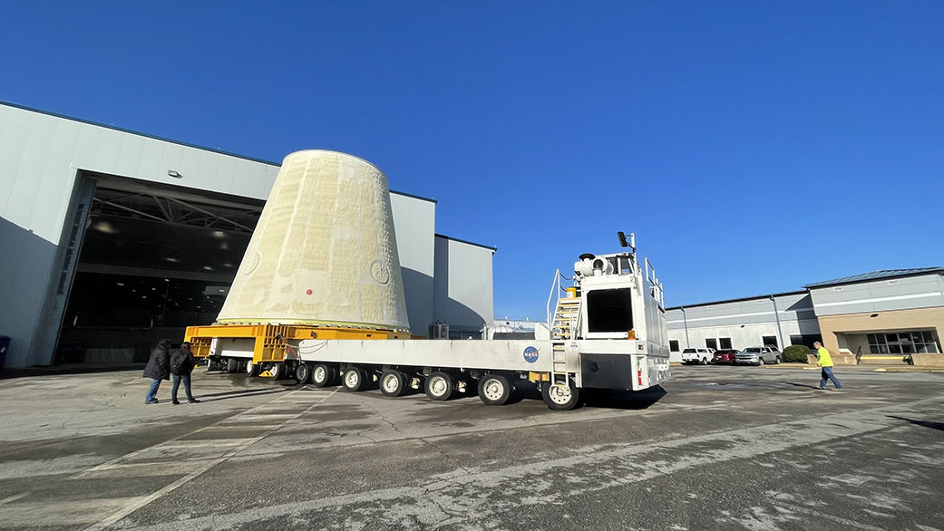 Technicians at NASA’s Marshall Space Flight Center move the Space Launch System (SLS) launch vehicle stage adapter for the Artemis II mission.