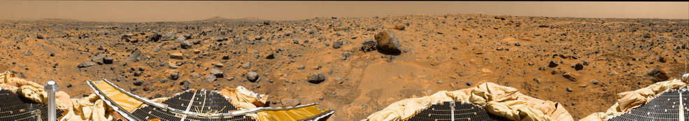 Panoramic view of Mars Pathfinder’s landing site, with the Sojourner rover
at center, sampling the rock nicknamed Yogi.