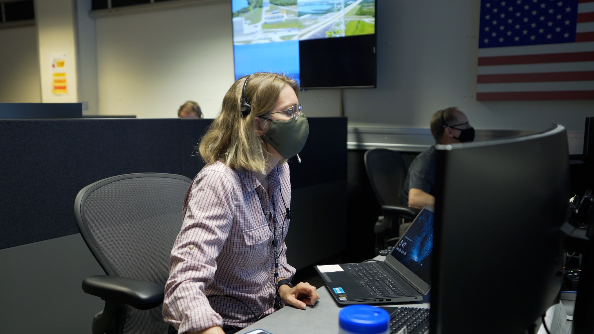 Team members in the Space Launch System (SLS) Engineering Support Center at NASA’s Marshall Space Flight Center