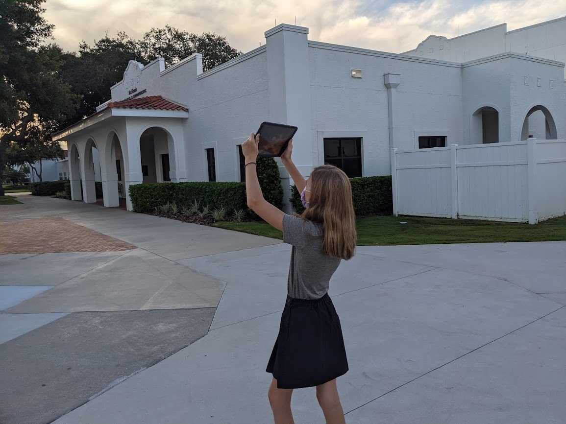 A middle school science student at Montverde Academy in Montverde, Florida gathers data to share with NASA scientists.