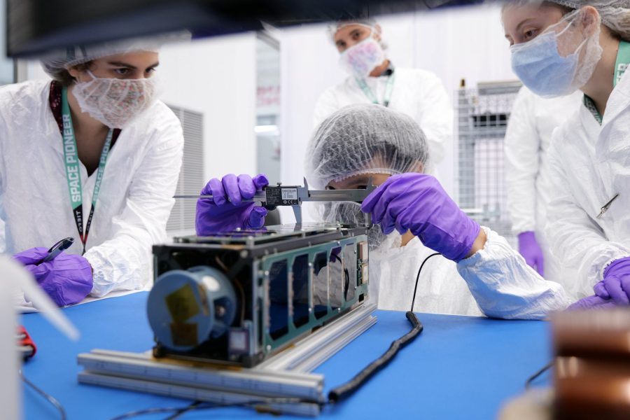 Cornell University students work with the Pathfinder for Autonomous Navigation (PAN), a CubeSat that is part of NASA's 29th ELaNa mission.