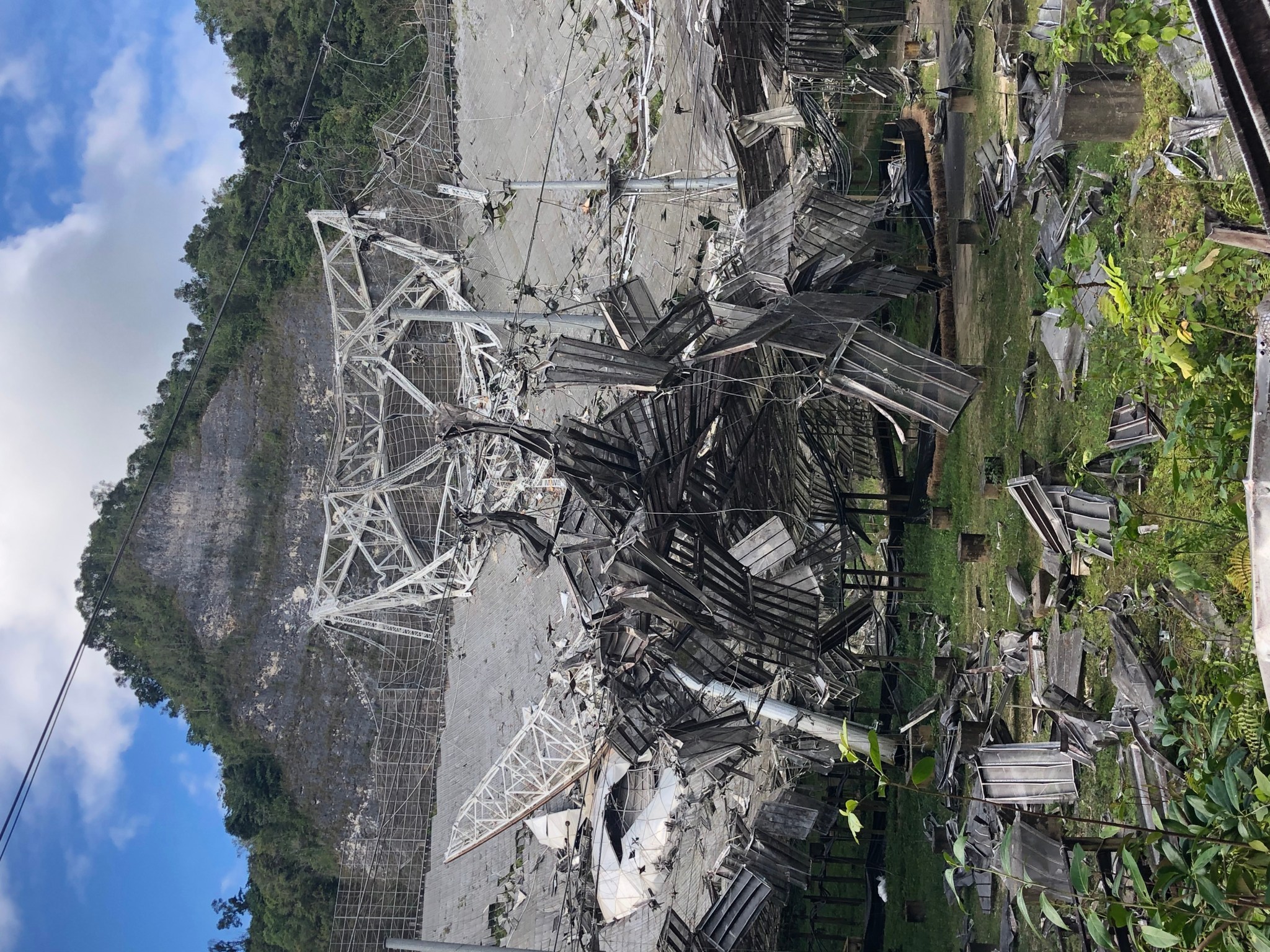 Damage to the 305-meter telescope at Arecibo Observatory in Puerto Rico, after its collapse on Dec. 1, 2020. The remains of the instrument platform are visible on the telescope’s dish. 