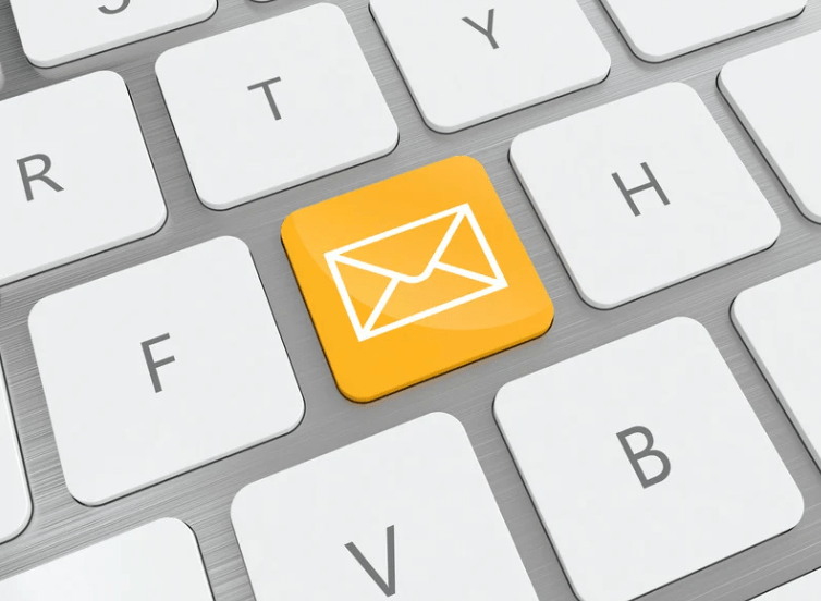 keyboard with a yellow mail key