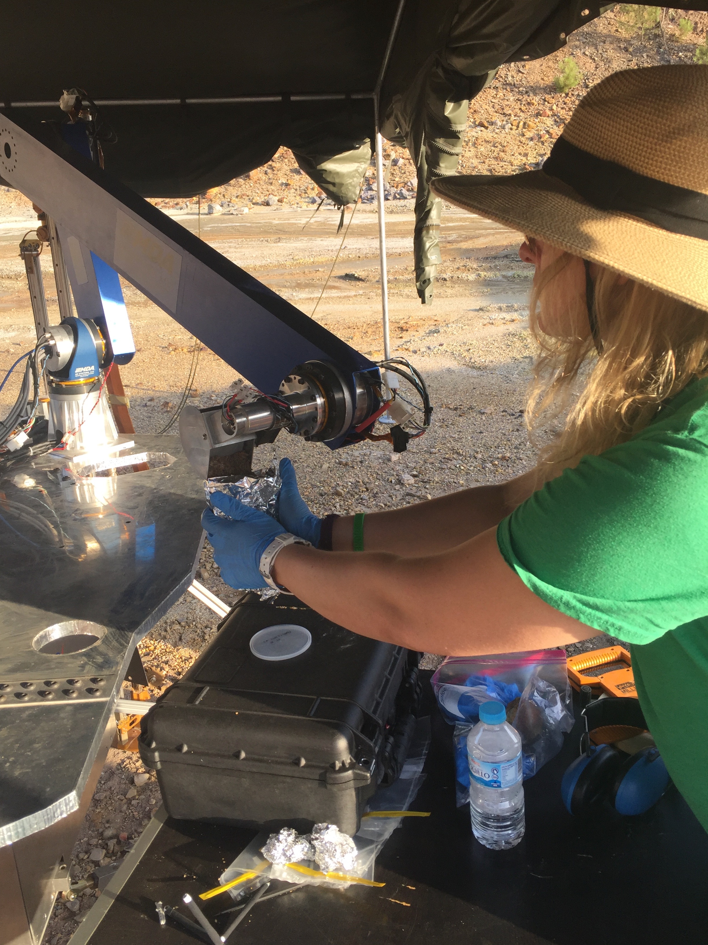 Deniz Burnham at a field test of drilling and sampling prototype instruments, as part of the Life-detection Mars Analog Project's deployment at the Rio Tinto, Spain, Mars-analog site in the summer of 2017.