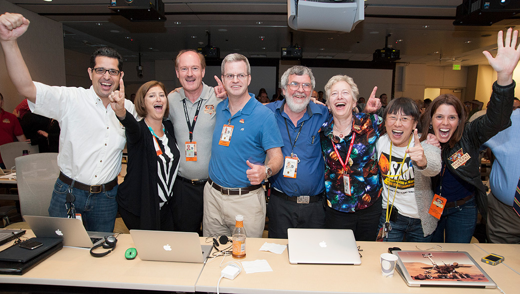 Laurie Leshin, second from left, celebrates the landing of NASA’s Curiosity rover