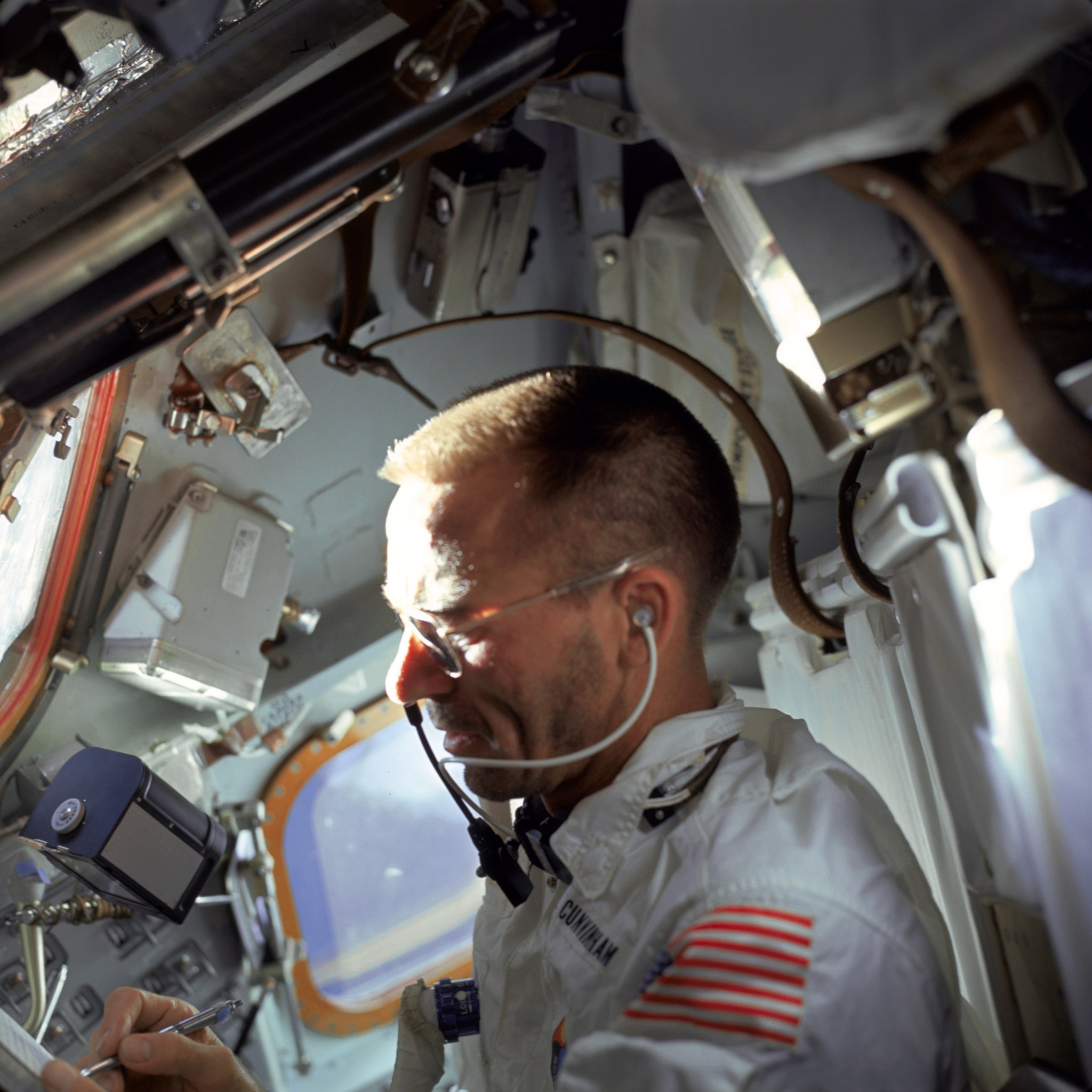 U.S. astronaut Walter Cunningham writes with a Fisher Space Pen during the flight of Apollo 7, the first crewed Apollo flight and the Space Pen’s first trip to space. The pens have been used on every crewed NASA mission since.  