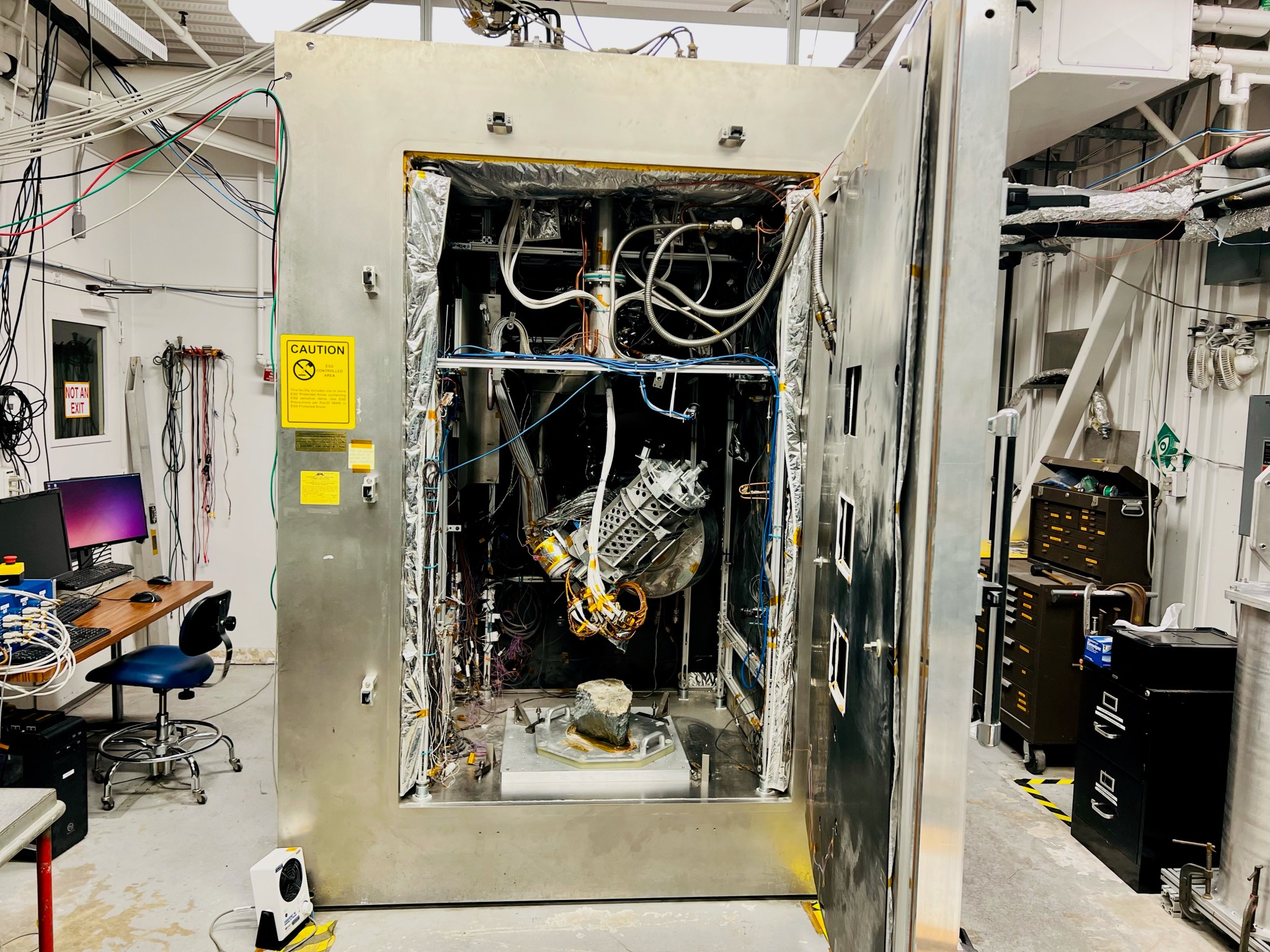 Engineers working with NASA’s Perseverance Mars rover set up this test area at JPL to practice drilling into crumbly rocks using a duplicate of the rover’s rock-coring drill.