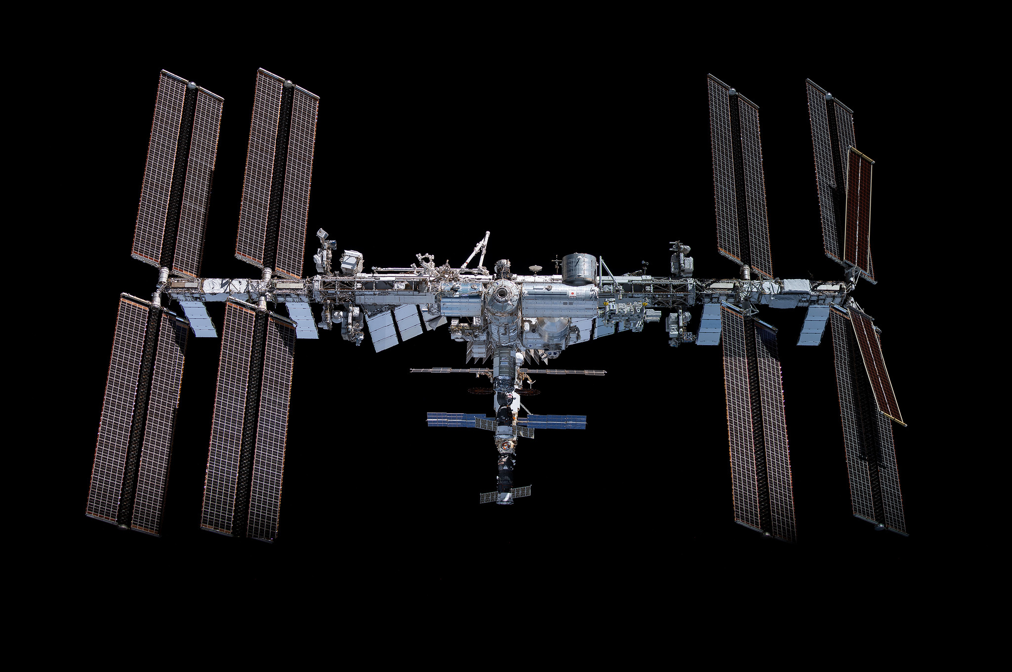 This mosaic depicts the International Space Station pictured from the SpaceX Crew Dragon Endeavour during a fly around of the orbiting lab that took place following its undocking from the Harmony module’s space-facing port on Nov. 8, 2021.