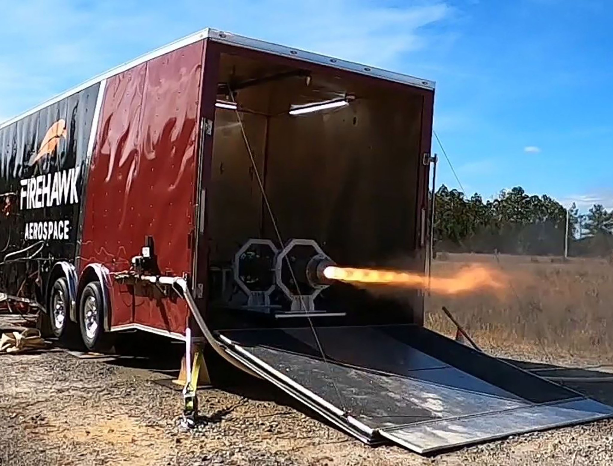 Firehawk Aerospace uses a newly built “roadable test stand” to conduct a hot fire test of its Armstrong 1k test article Dec. 1, 2021, at Stennis Space Center near Bay St. Louis, Mississippi