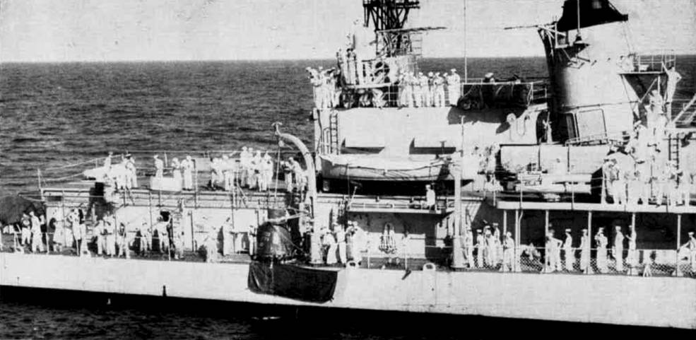 hoists_friendship_7_capsule_aboard_1962_us_navy