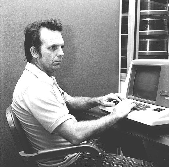 Mathematician Ronnie Pearson works at a computer