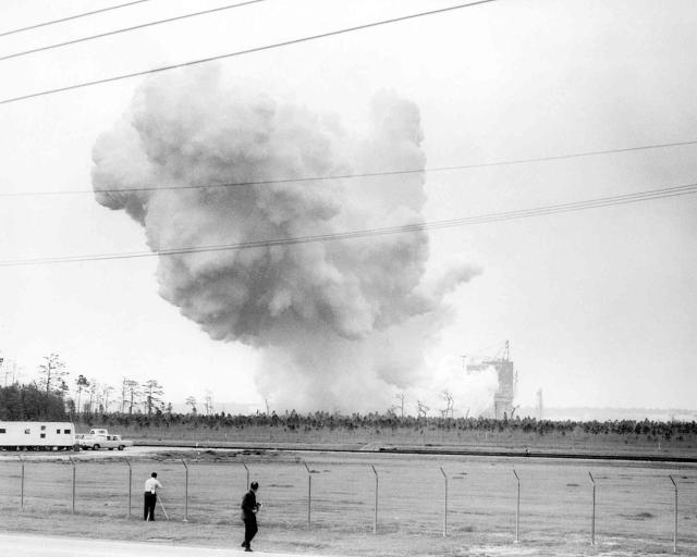 A plume of smoke rises from the horizon during the first Saturn V rocket booster (S-II-T) test at MTF.