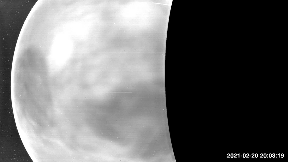 grayscale animated images of Venus from space showing dark and light variations/