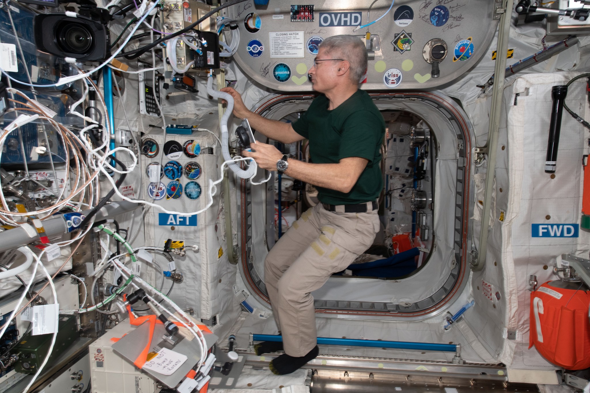 image of astronaut setting up radio hardware