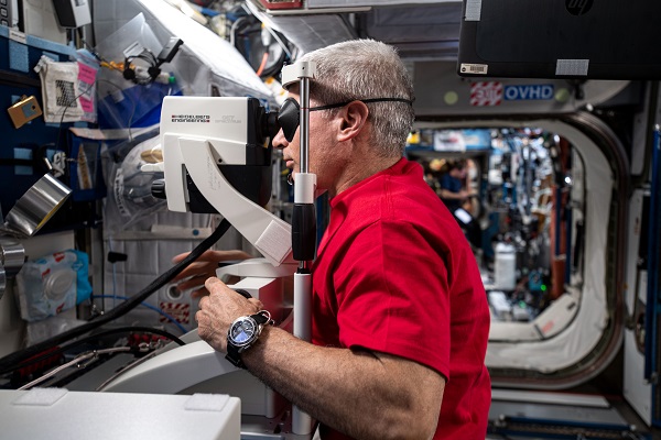 image of an astronaut taking an eye exam