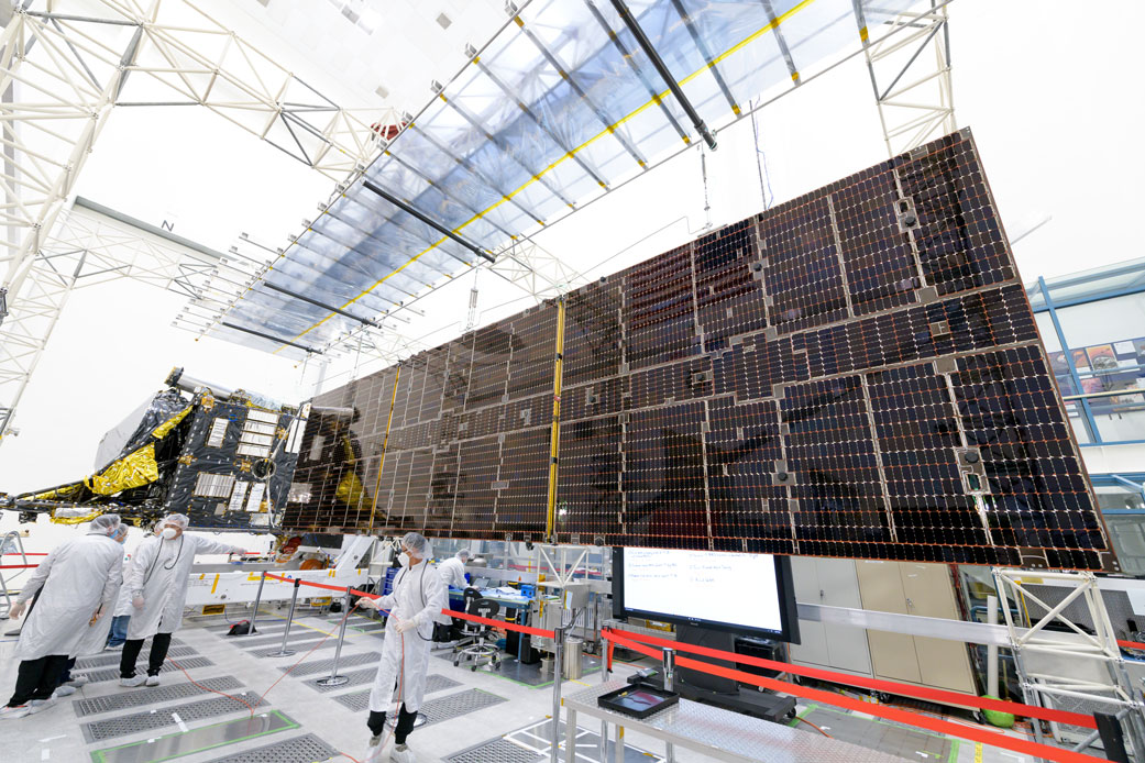 The first of two solar arrays on NASA’s Psyche spacecraft is successfully deployed in JPL’s storied High Bay 2 clean room.