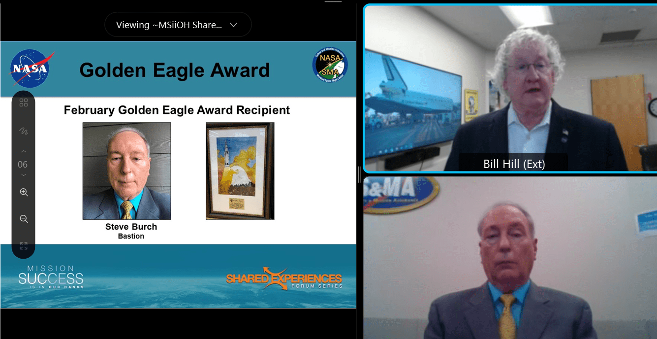 Bill Hill, top right,  presents Steve Burch with the Golden Eagle Award during the Mission Success is in Our Hands virtual lecture series Feb. 17. 