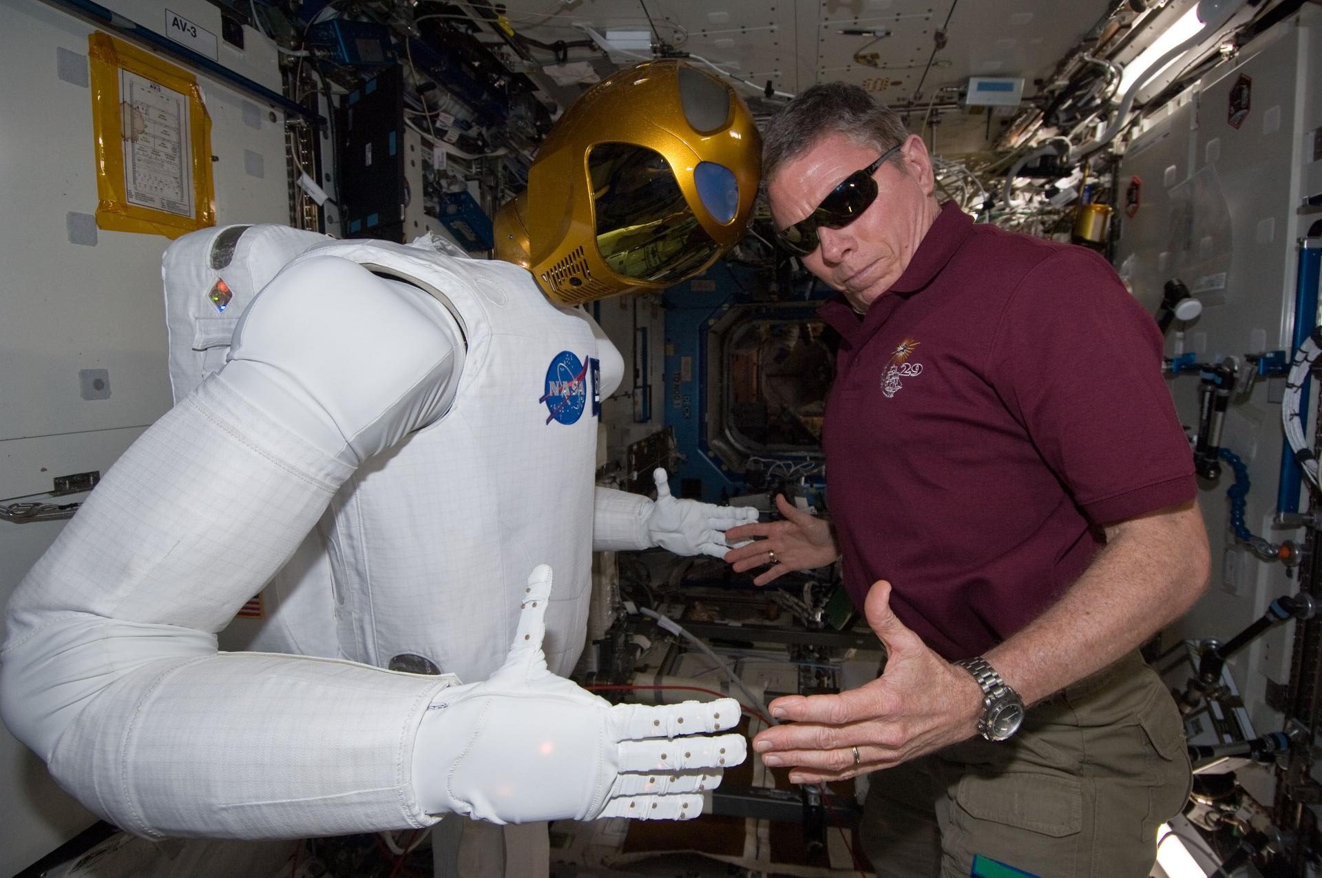 Mike Fossum and Robonaut 2 in the Destiny laboratory of the ISS