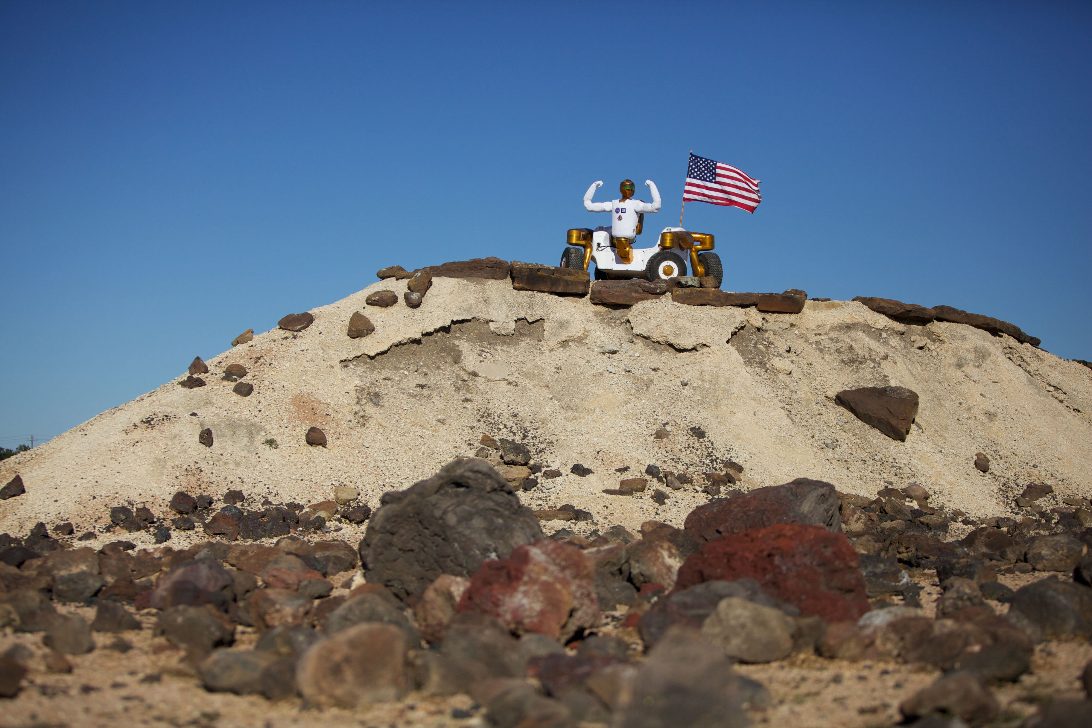 Robonaut 2 poses atop its new wheeled base, Centaur 2, at the Johnson Space Center Planetary Analog Test Site.