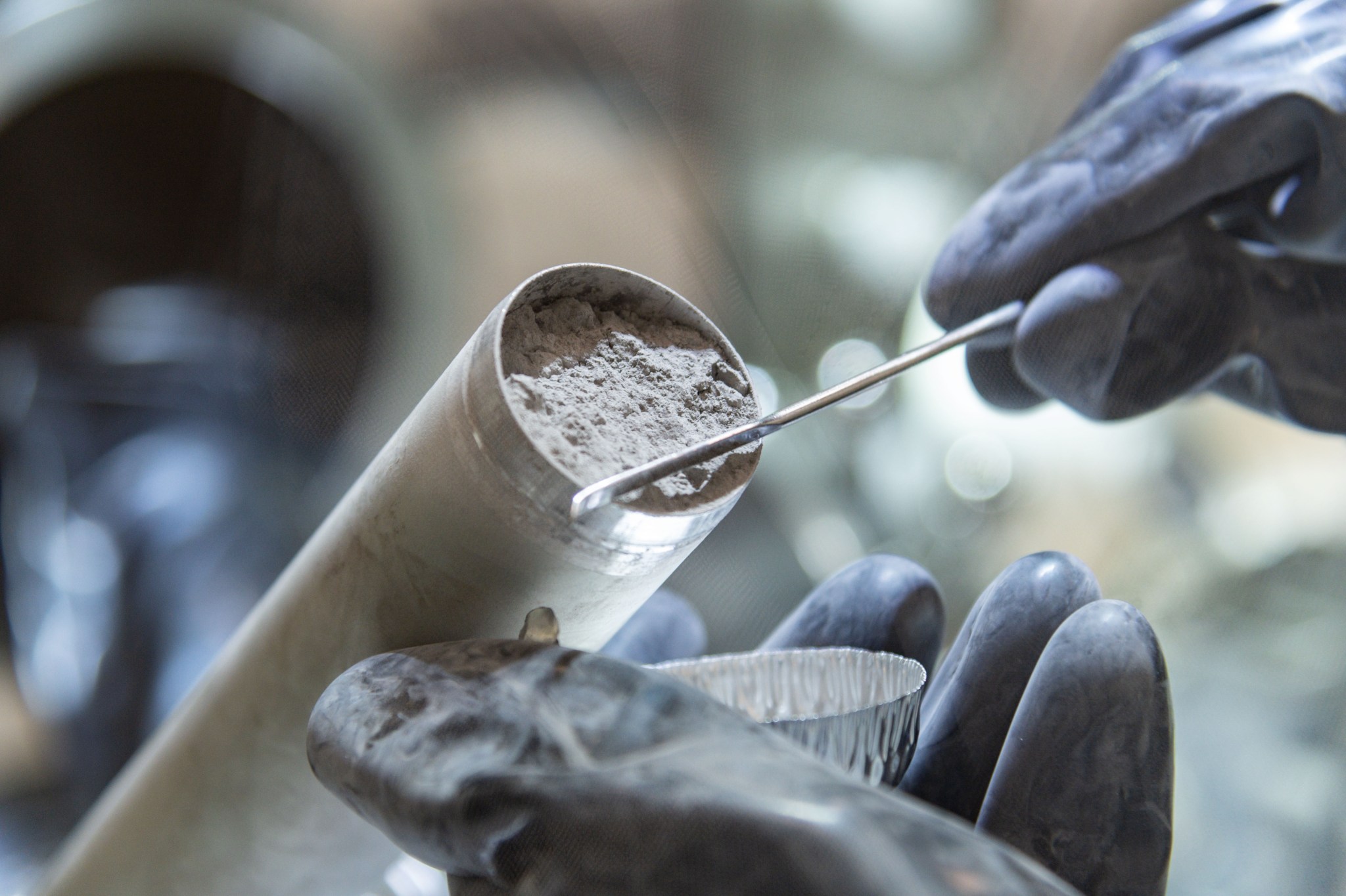 A close-up of Apollo 17 lunar core sample 73001 being taken out of its drive tube for the first time since it was collected by Apollo astronauts in December 1972 at NASA’s Johnson Space Center in Houston.