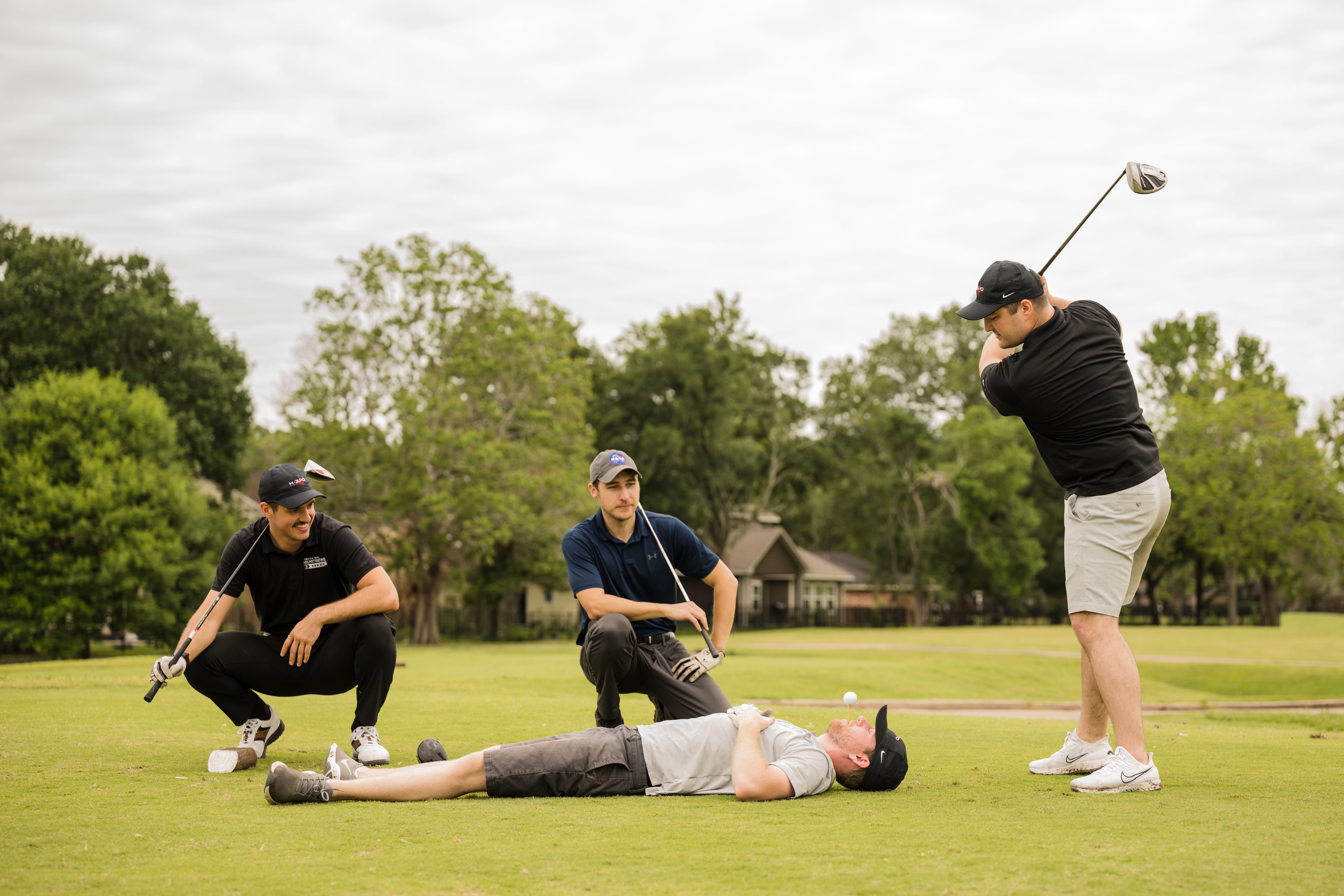 Golfers posing for fun