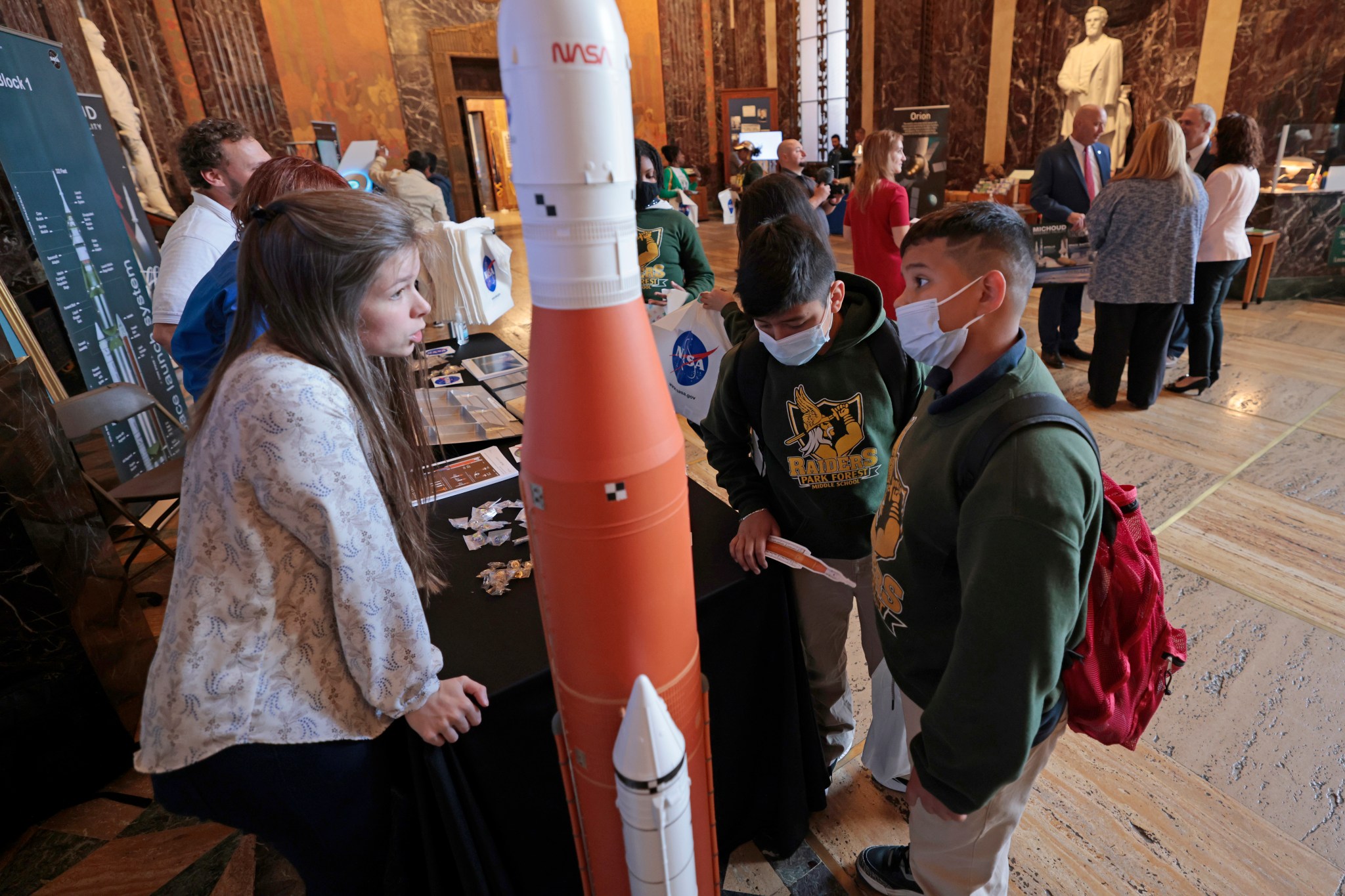 Students visit an SLS exhibit in the Louisiana Capitol rotunda. 