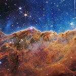 This landscape of “mountains” and “valleys” speckled with glittering stars is actually the edge of a nearby, young, star-forming region called NGC 3324 in the Carina Nebula. Captured in infrared light by NASA’s new James Webb Space Telescope, this image reveals for the first time previously invisible areas of star birth.