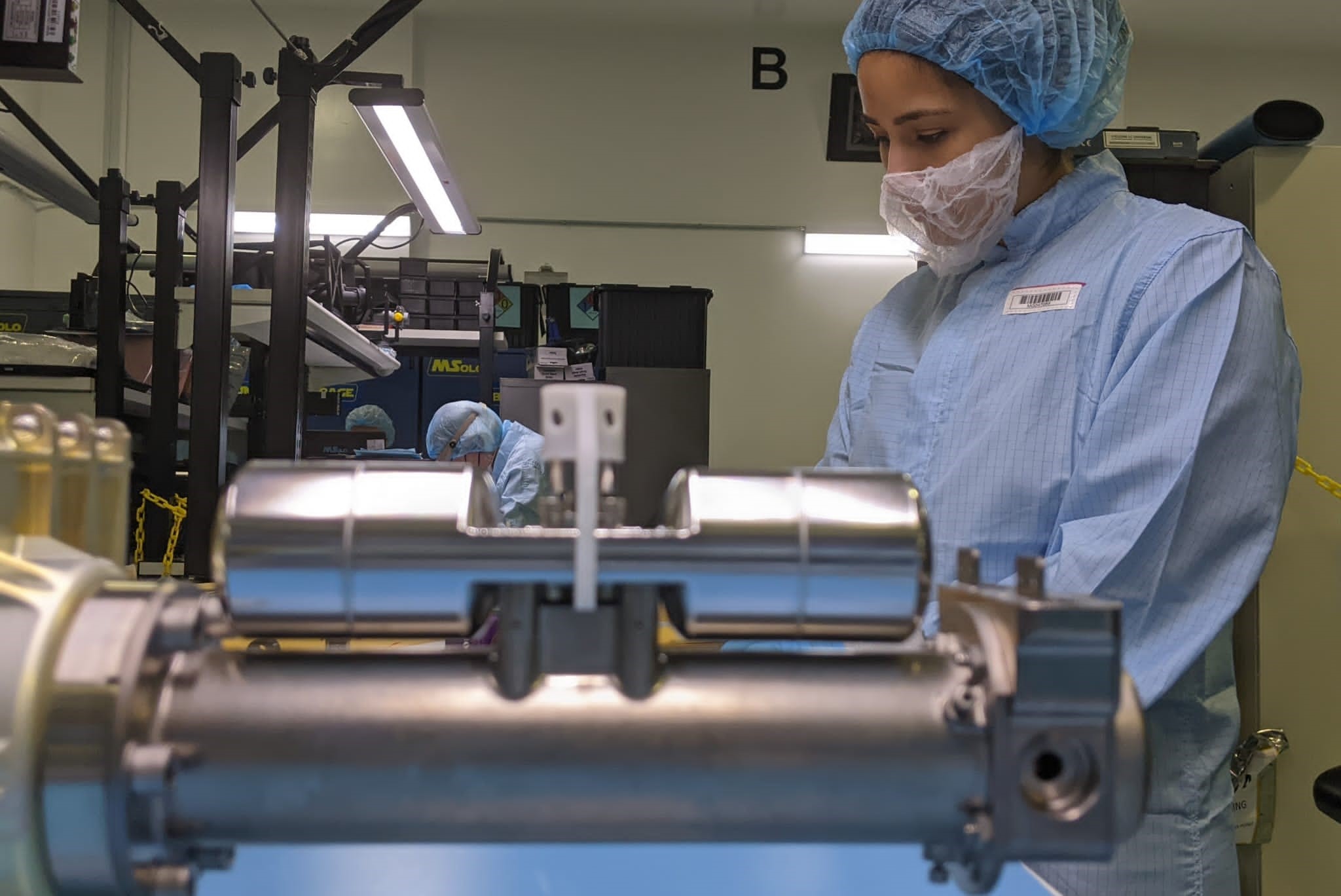 Patricia Velandia working on equipment.