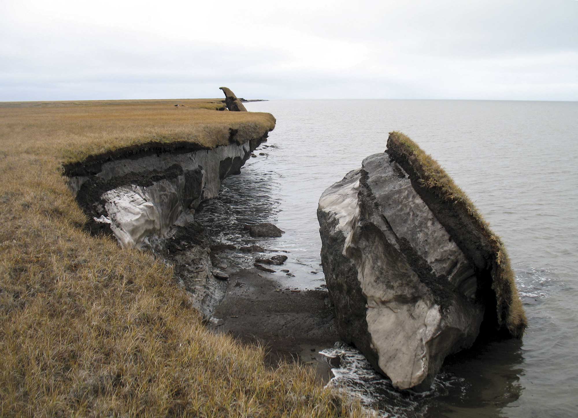 Thawing permafrost can result in the loss of terrain, as seen in this image where part of the coastal bluff along Drew Point, Alaska, has collapsed into the ocean.