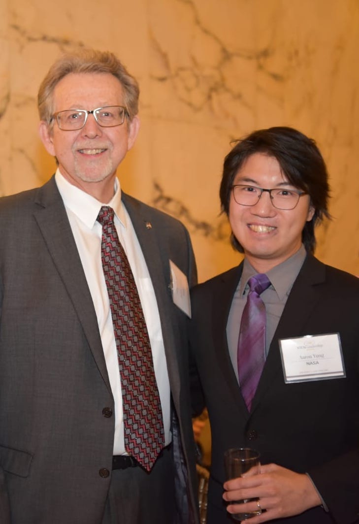 Postdoctoral fellow Aaron Yung with NASA Gravity Assist host Jim Green.