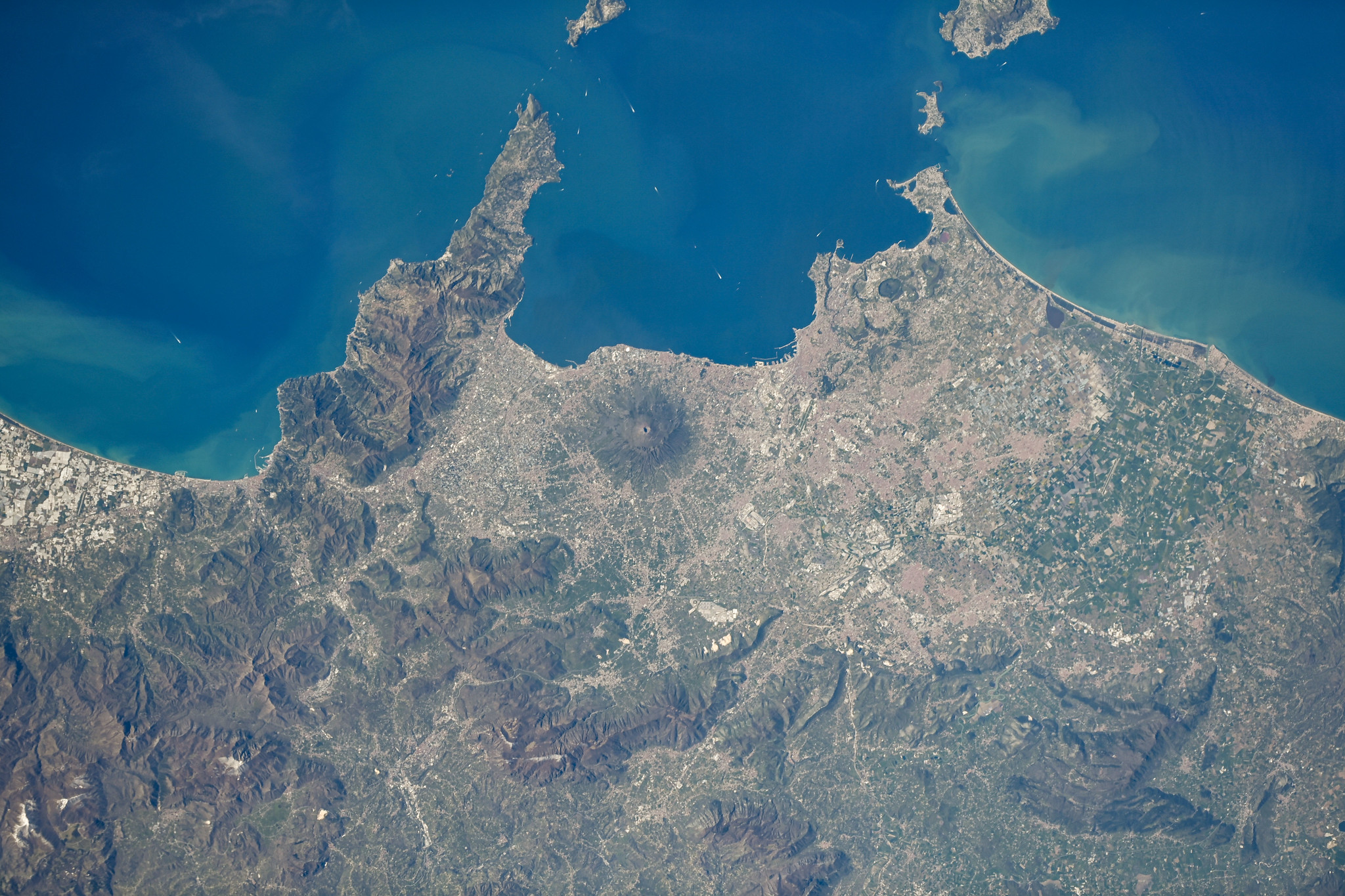 image of a volcano near a coast on Earth