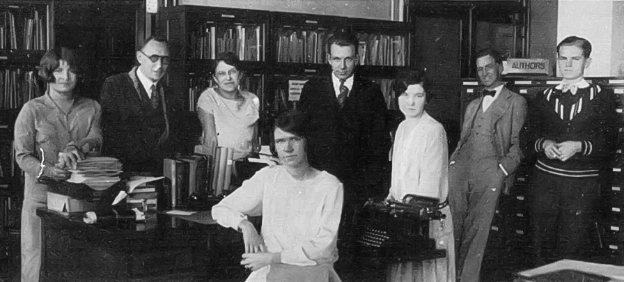 This is a photo of the 1925 staff of the Library, Files, Stenographic Section, Purchase, Personnel, Telephone Exchange, and Property.