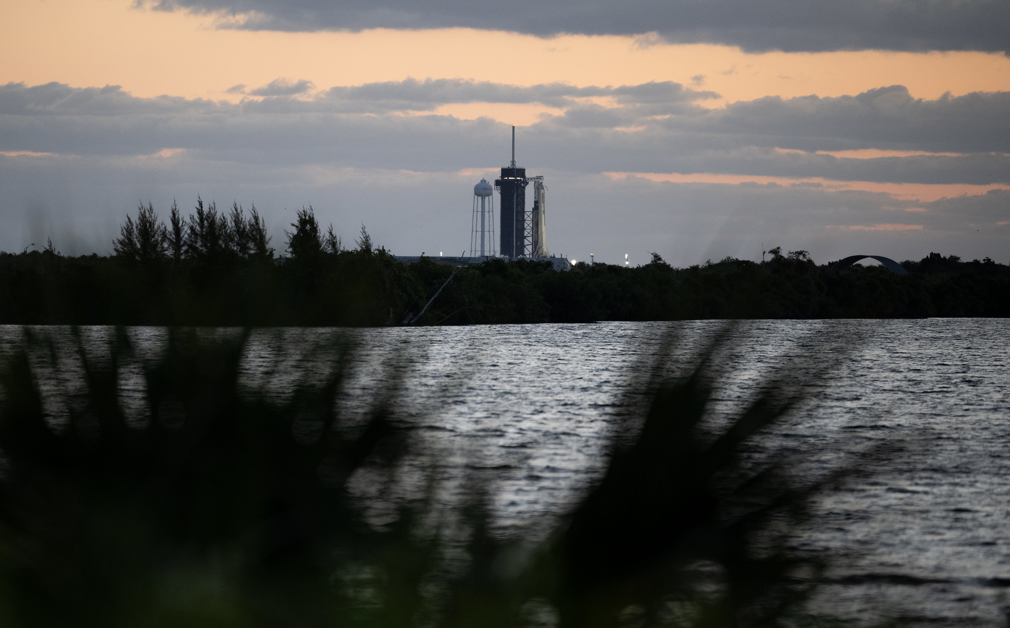 A SpaceX Falcon 9 rocket with the company's Crew Dragon spacecraft onboard is seen at sunrise on the launch pad at Launch Complex 39A as preparations continue for the Crew-4 mission, Wednesday, April 20, 2022, at NASA’s Kennedy Space Center in Florida. NASA’s SpaceX Crew-4 mission is the fourth crew rotation mission of the SpaceX Crew Dragon spacecraft and Falcon 9 rocket to the International Space Station as part of the agency’s Commercial Crew Program. NASA astronauts Kjell Lindgren, Robert Hines, Jessica Watkins, and ESA (European Space Agency) astronaut Samantha Cristoforetti are scheduled to launch on April 23 at 5:26 a.m. EDT, from Launch Complex 39A at the Kennedy Space Center.