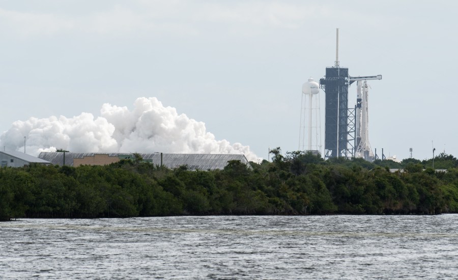 A SpaceX Falcon 9 rocket with the company's Crew Dragon spacecraft onboard is seen on the launch pad at Launch Complex 39A during a brief static fire test ahead of NASA’s SpaceX Crew-4 mission, Wednesday, April 20, 2022, at NASA’s Kennedy Space Center in Florida. NASA’s SpaceX Crew-4 mission is the fourth crew rotation mission of the SpaceX Crew Dragon spacecraft and Falcon 9 rocket to the International Space Station as part of the agency’s Commercial Crew Program. NASA astronauts Kjell Lindgren, Robert Hines, Jessica Watkins, and ESA (European Space Agency) astronaut Samantha Cristoforetti are scheduled to launch on April 23 at 5:26 a.m. EDT, from Launch Complex 39A at the Kennedy Space Center.