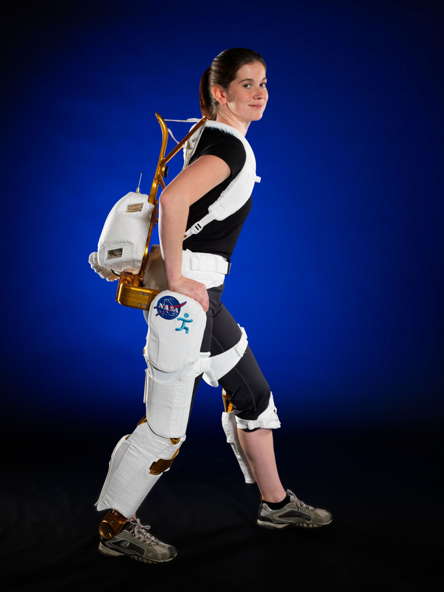 Project Engineer Shelley Rea demonstrates the  X1 Robotic Exoskeleton for resistive exercise, rehabilitation and mobility augmentation in the Advanced Robotics Development Lab in Building 32A Room 1000. Photo Date: 6/1/2012 Location: B32A, Room 1000 Photographer: Robert Markowitz