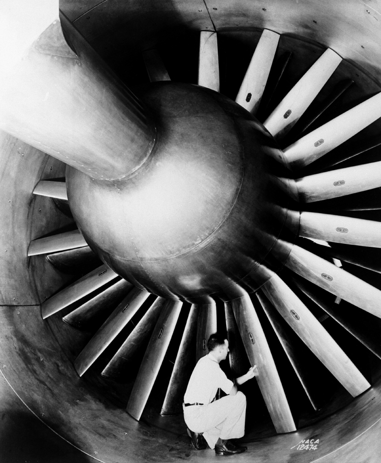 The fan blades in the 8-Foot High-Speed Tunnel in 1936. The researcher is unknown.