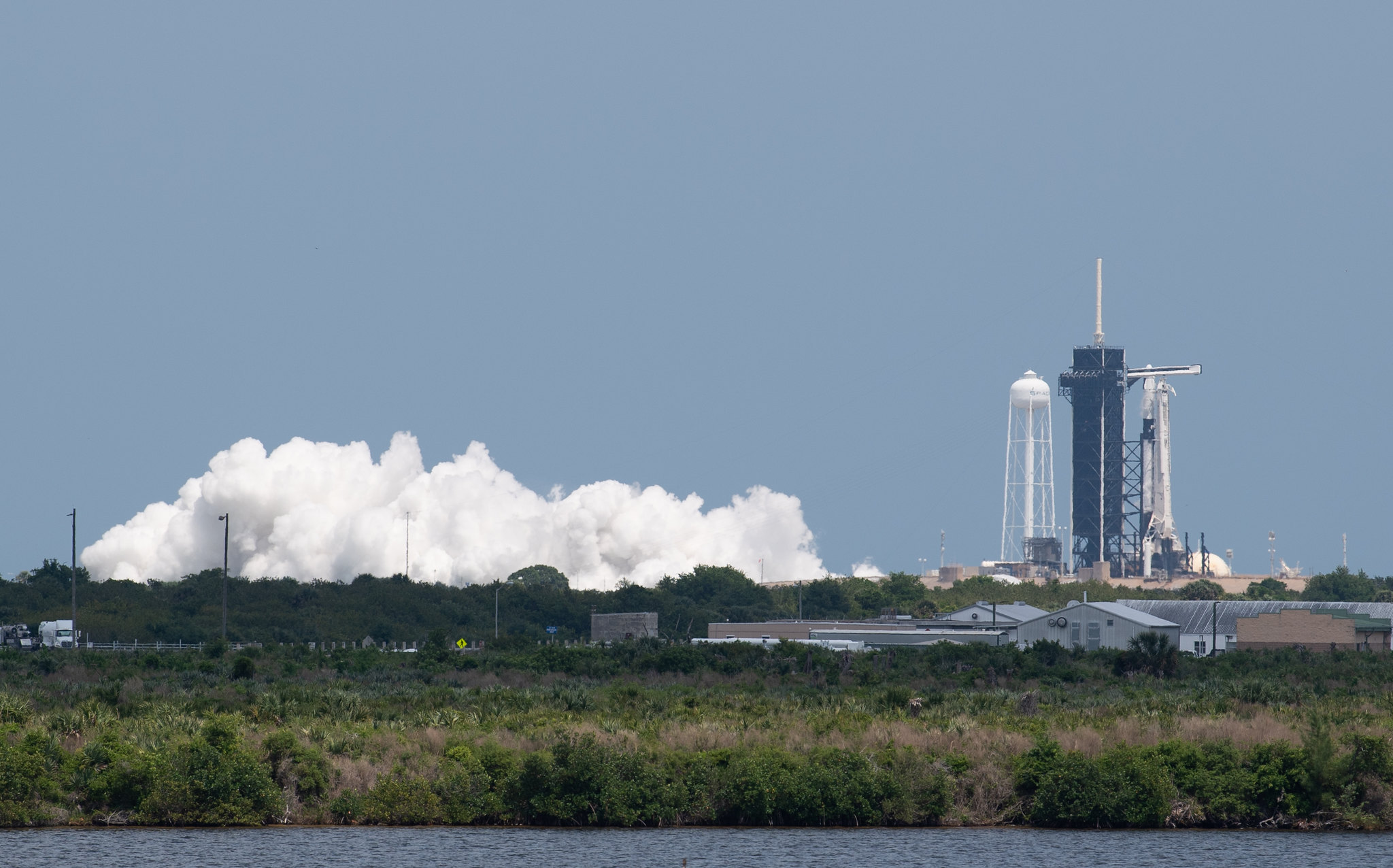 A SpaceX Falcon 9 rocket with the company's Crew Dragon spacecraft aboard is seen on the launch pad at Launch Complex 39A during a brief static fire test ahead of Axiom Mission 1 (Ax-1), Wednesday, April 6, 2022, at NASA’s Kennedy Space Center in Florida.