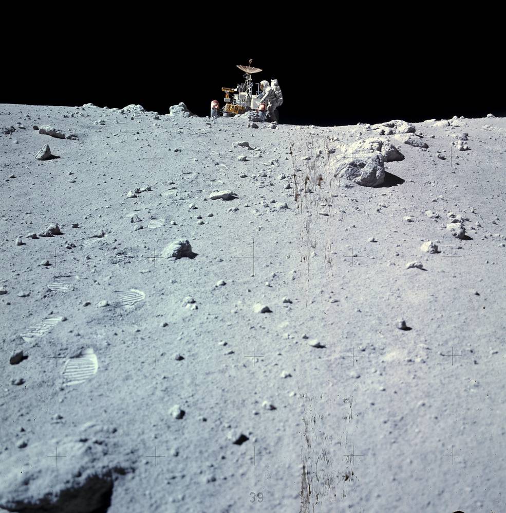 apollo_16_landing_eva3_sta_11_w_rover_and_duke