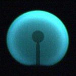 A spherical blue flame with an interior conductor.