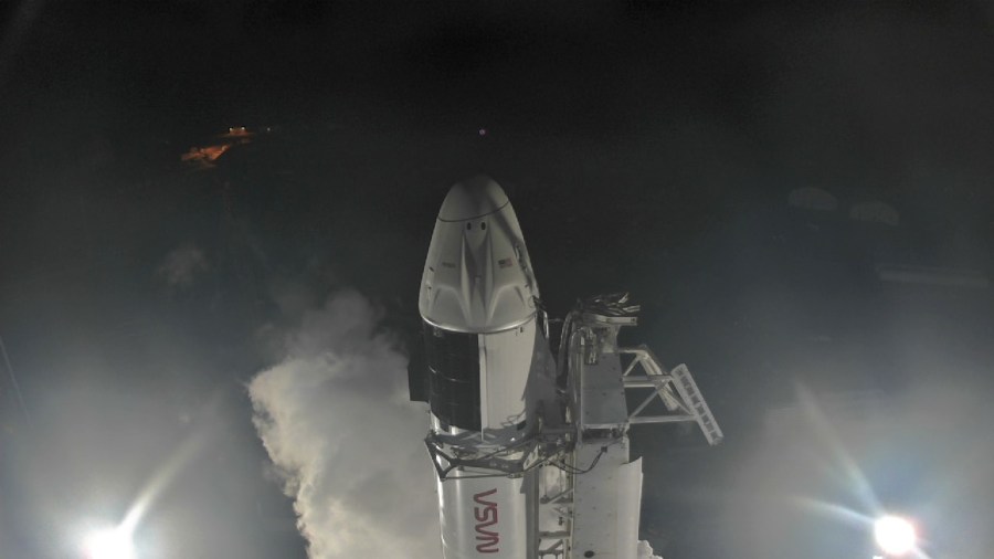 SpaceX’s Falcon 9 rocket with the Crew Dragon atop is seen at Kennedy Space Center’s Launch Complex 39A on April 26, 2022, as fueling commences ahead of the agency’s SpaceX Crew-4 launch.
