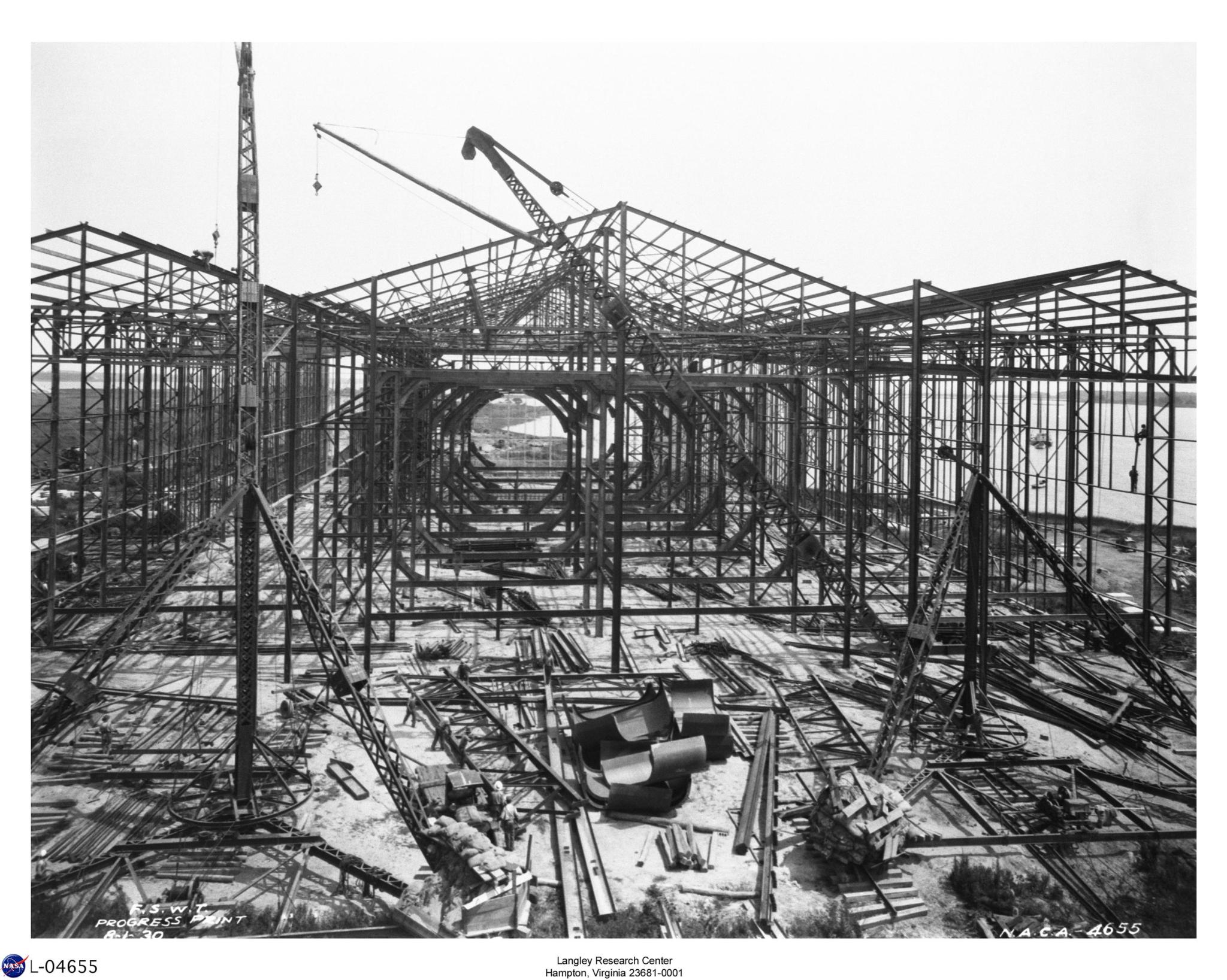 An Aug. 1, 1930, image showing the progression of the construction project’s framing of Building 643 and its Full-Scale Tunnel.