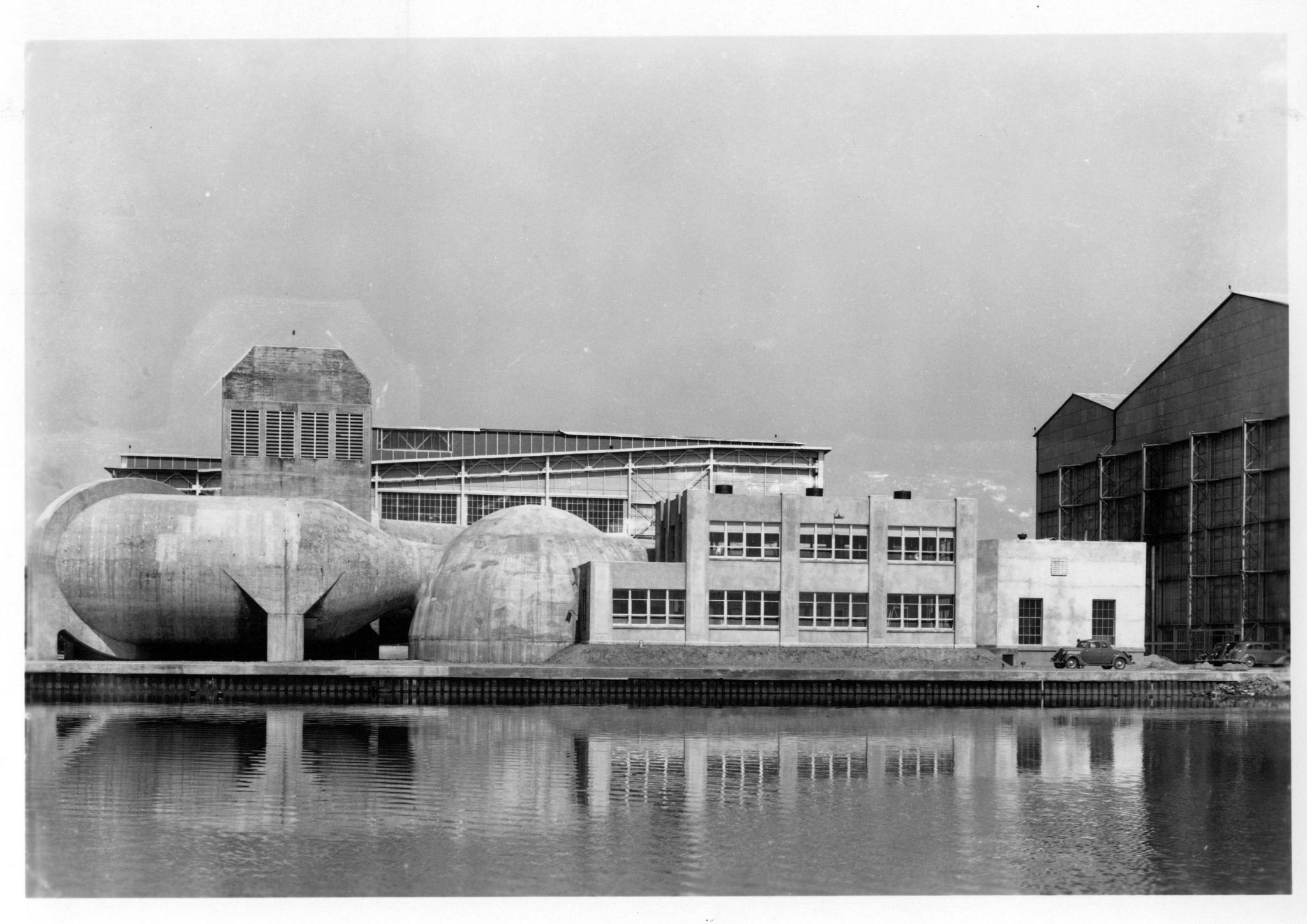 A view of Building 641, the 8-Foot High-Speed Tunnel complex, from the southwestern branch of the Back River in 1936.