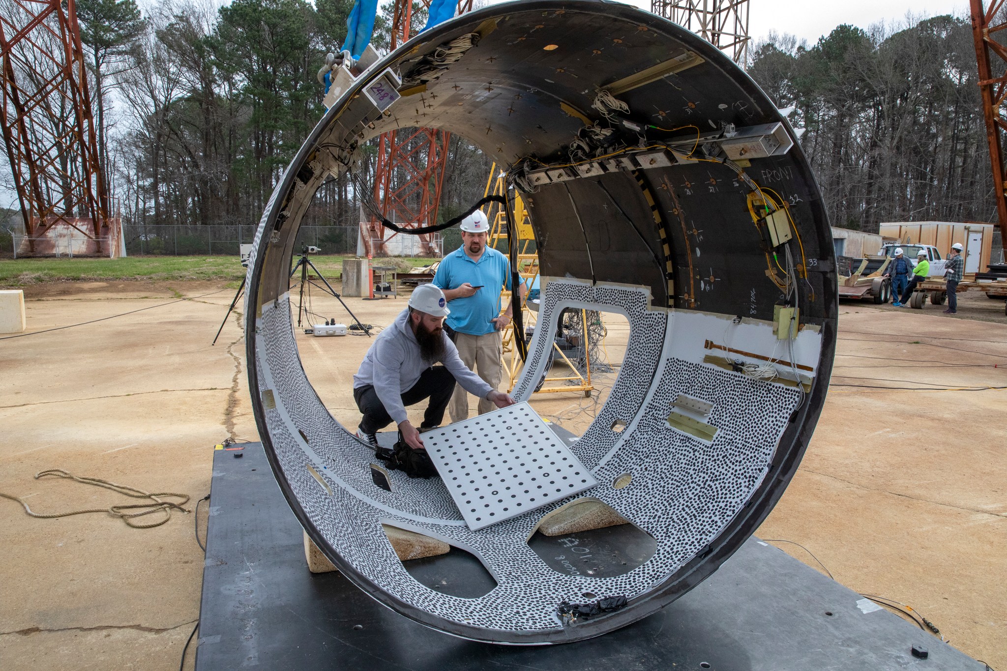 Engineers preparing for a drop test.