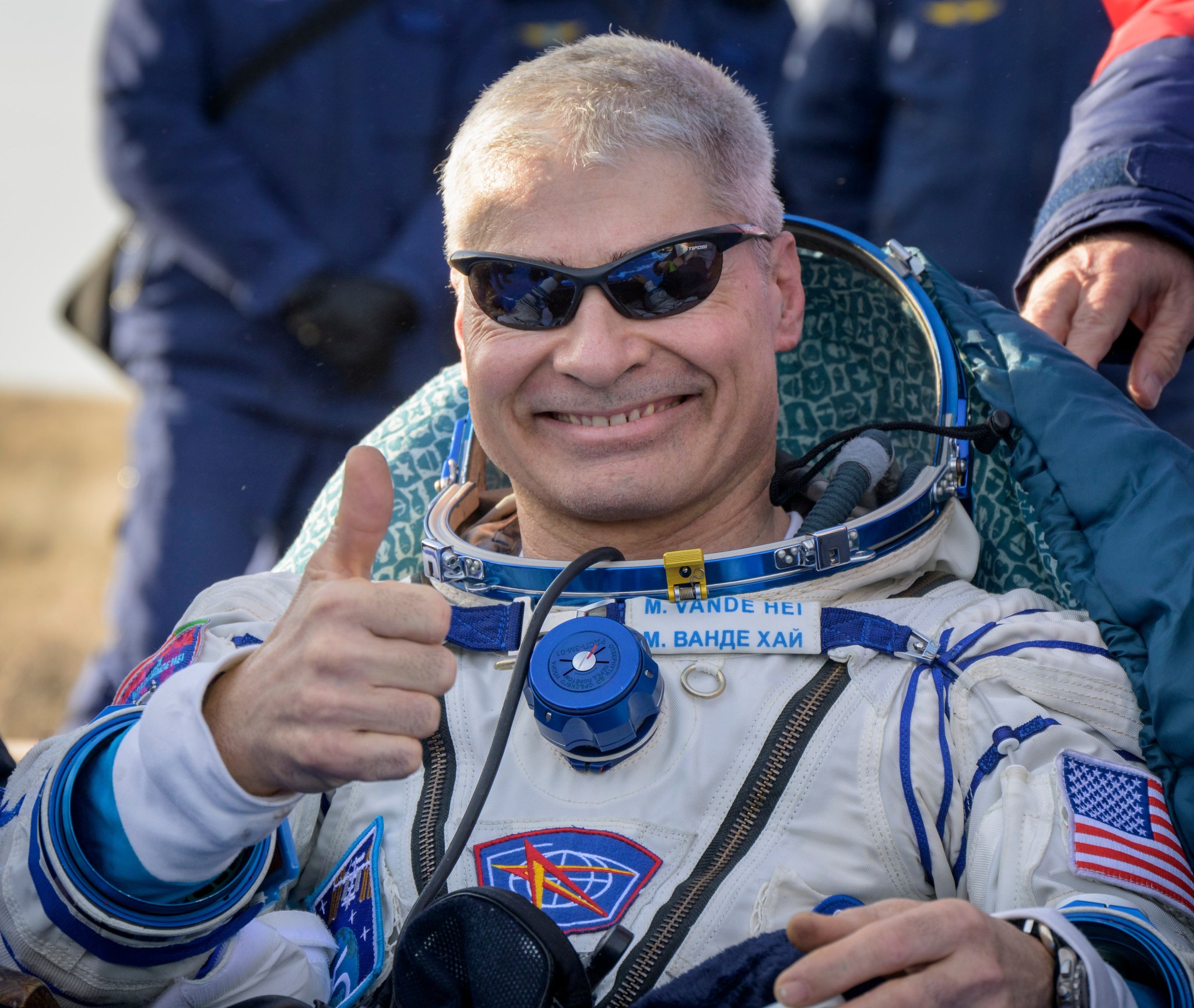 Mark Vande Hei's thumbs up after landing in Kazakhstan , Russia