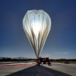 World View’s Stratollite high-altitude balloon is inflated on the launch pad.