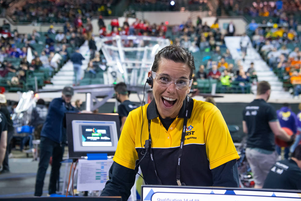 Head referee Erin Hubbard smiles for the camera.