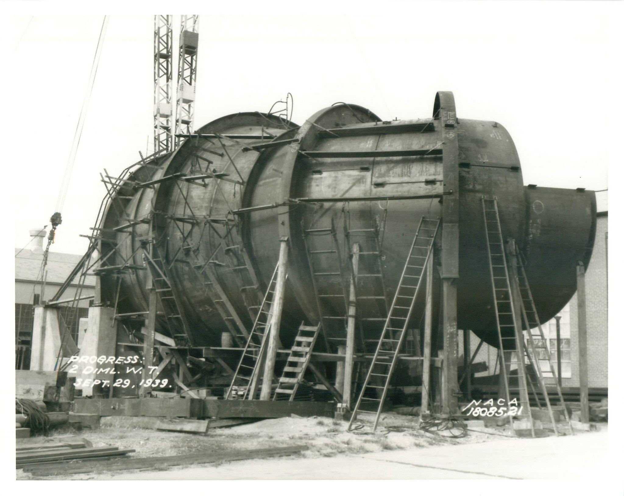 This is a photograph documenting the progress being made on the construction of the Low Turbulence Pressure Tunnel in 1939.