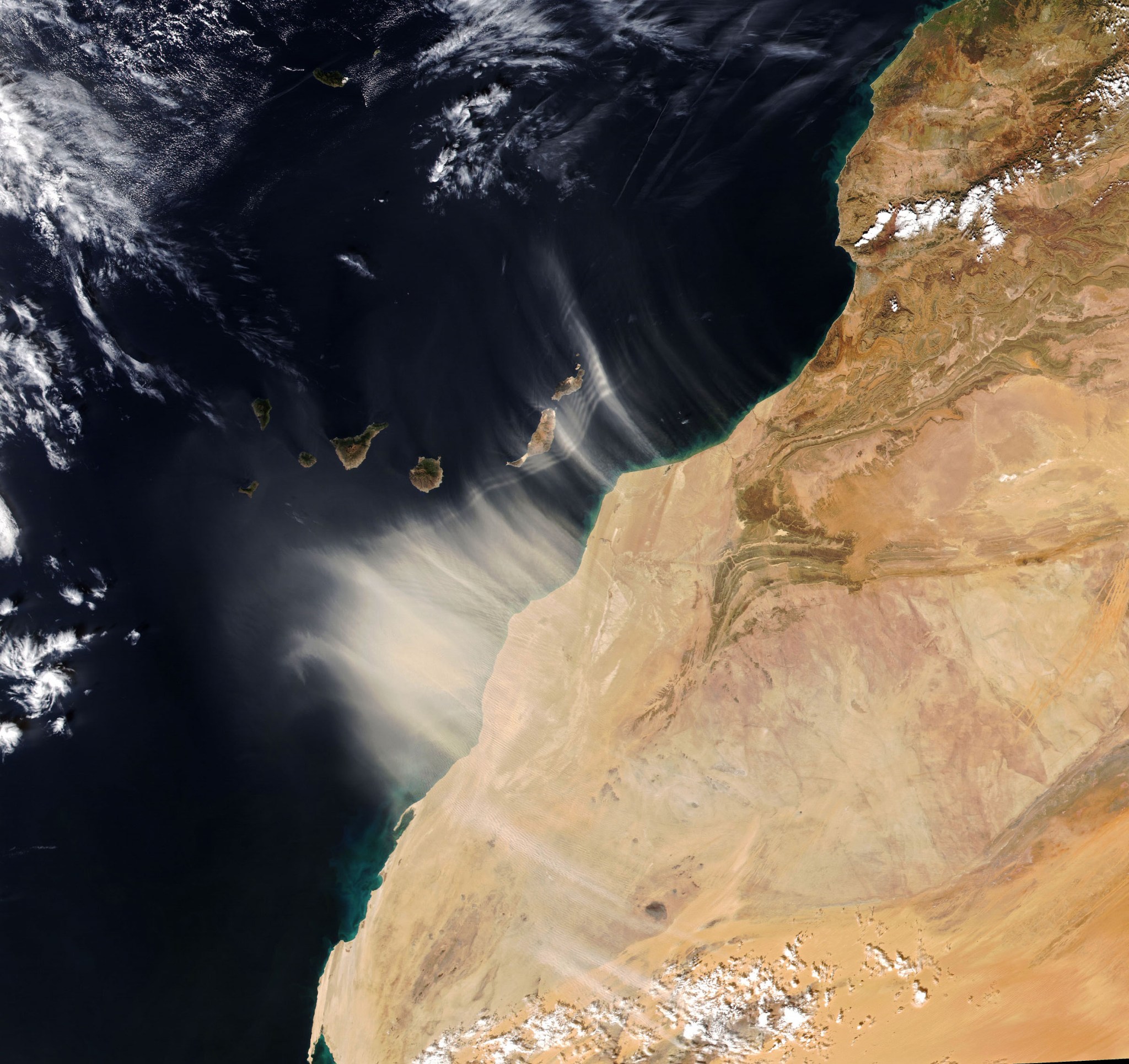 image of sand dust blowing off the African coast towards the ocean